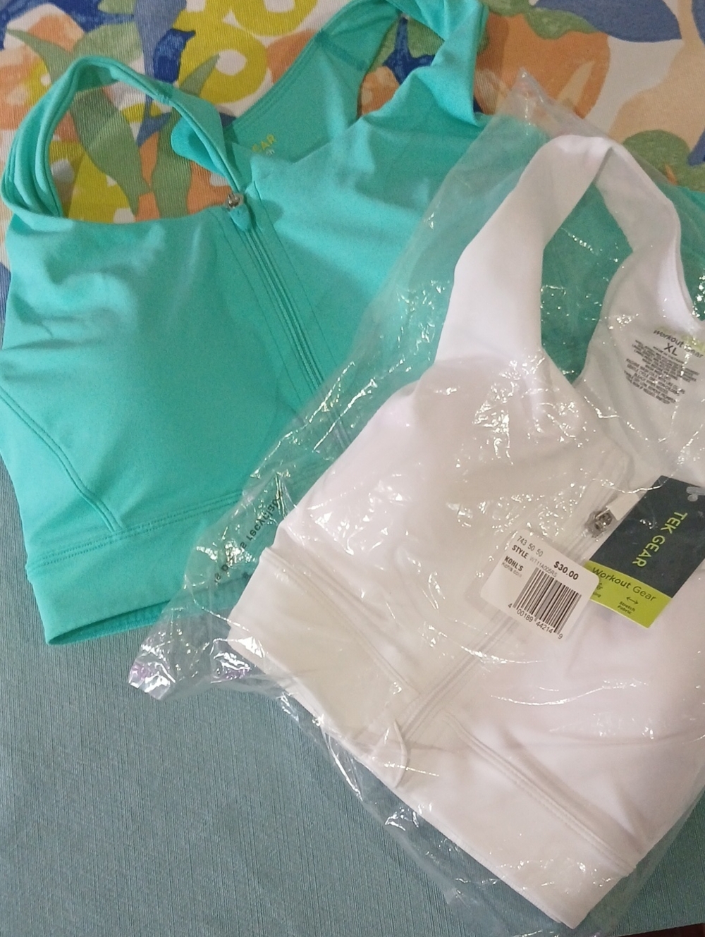 2 tek gear Zip-Front Workout Sports Bras. One Green And One White.